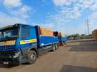 Holz abladen LKW
